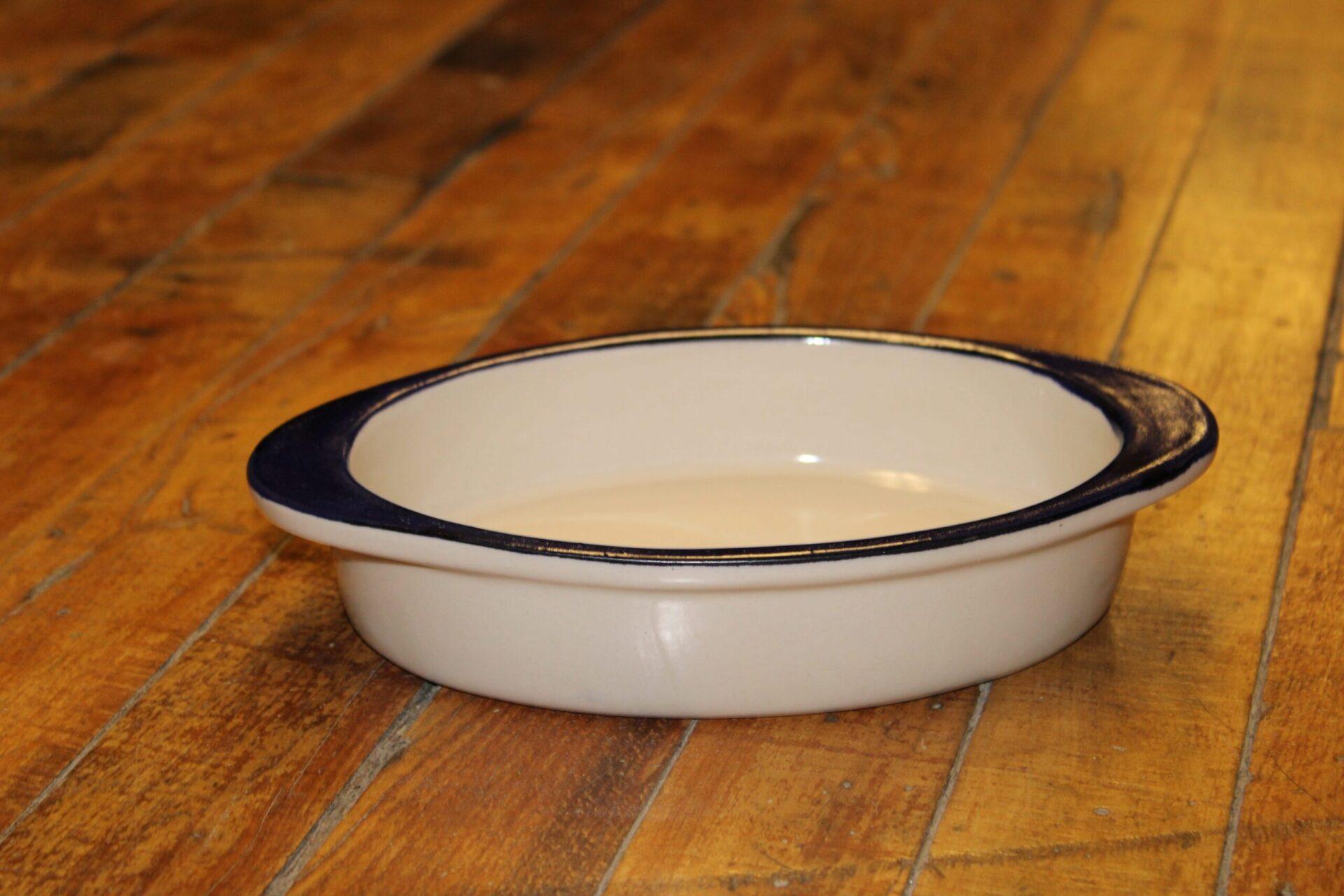 https://www.dutchcountrygeneralstore.com/wp-content/uploads/2020/10/Ohio-Stoneware-Au-Gratin-Baker-Bristol-Blue-Stripe-scaled.jpg